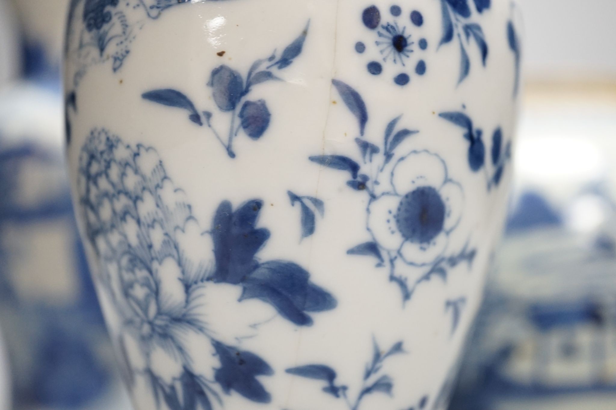 Twelve pieces of 19th century Chinese blue and white tableware and a small famille rose bowl, largest 20cm